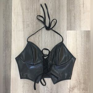 Black faux leather lace up halter crop top.